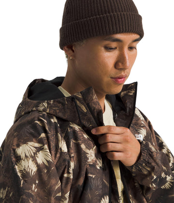 The North Face Antora Rain Hoodie hood adjustment closeup highlights adjustable drawcord for storm-ready fit