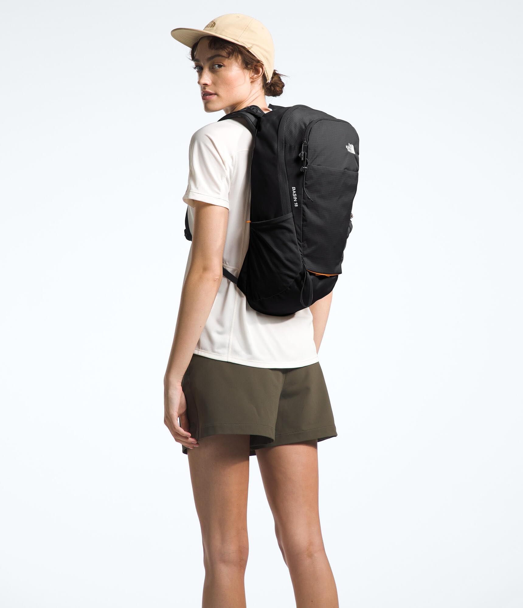 The North Face Basin 18L compact dimensions and weight on display.