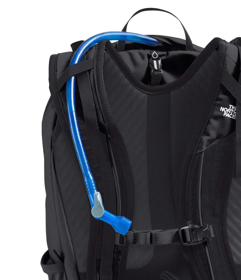 The North Face Basin 18L external stash pocket for quick access items.