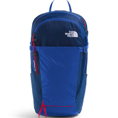 The North Face Basin 24L daypack with rain cover protects gear on wet trails.
