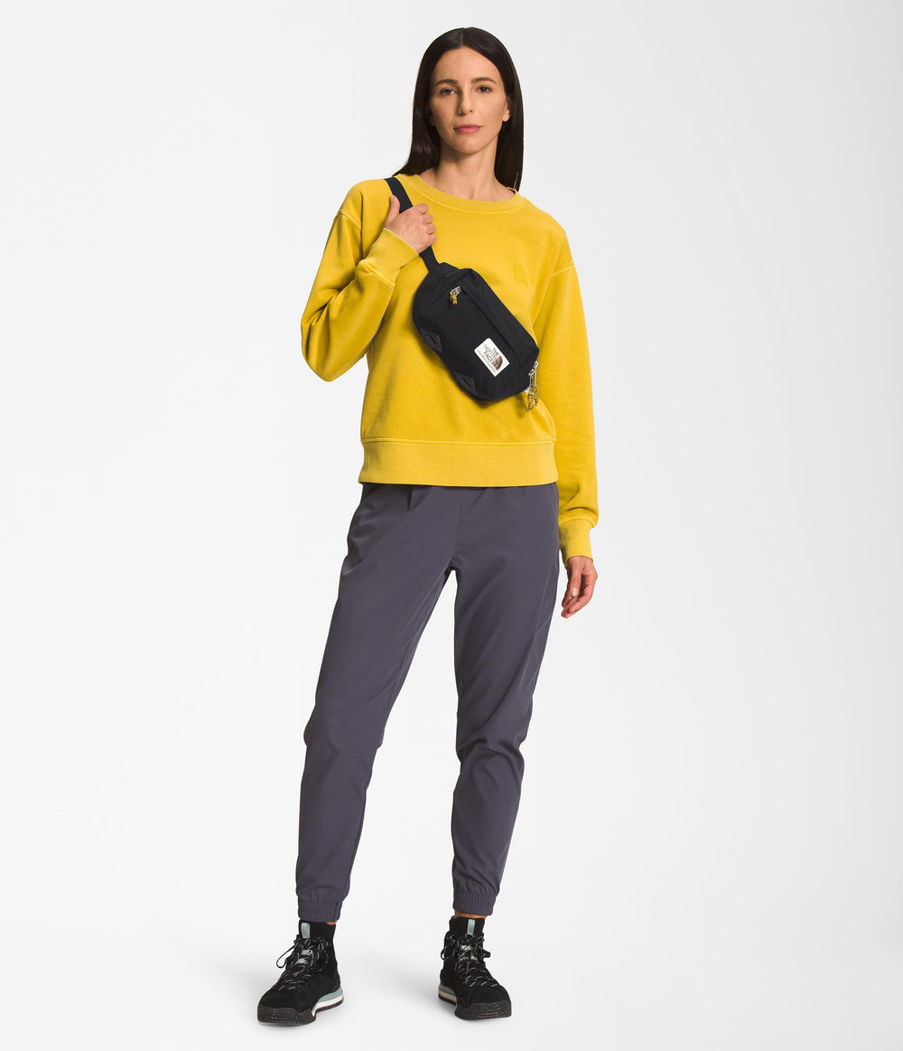 The North Face Berkeley Lumbar Bag with water-repellent finish keeps valuables dry in rain.