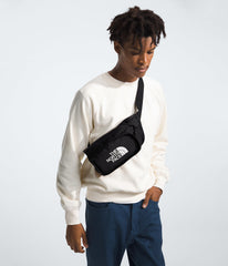 The North Face Explore Hip Pack side view highlighting adjustable strap for versatile wearing