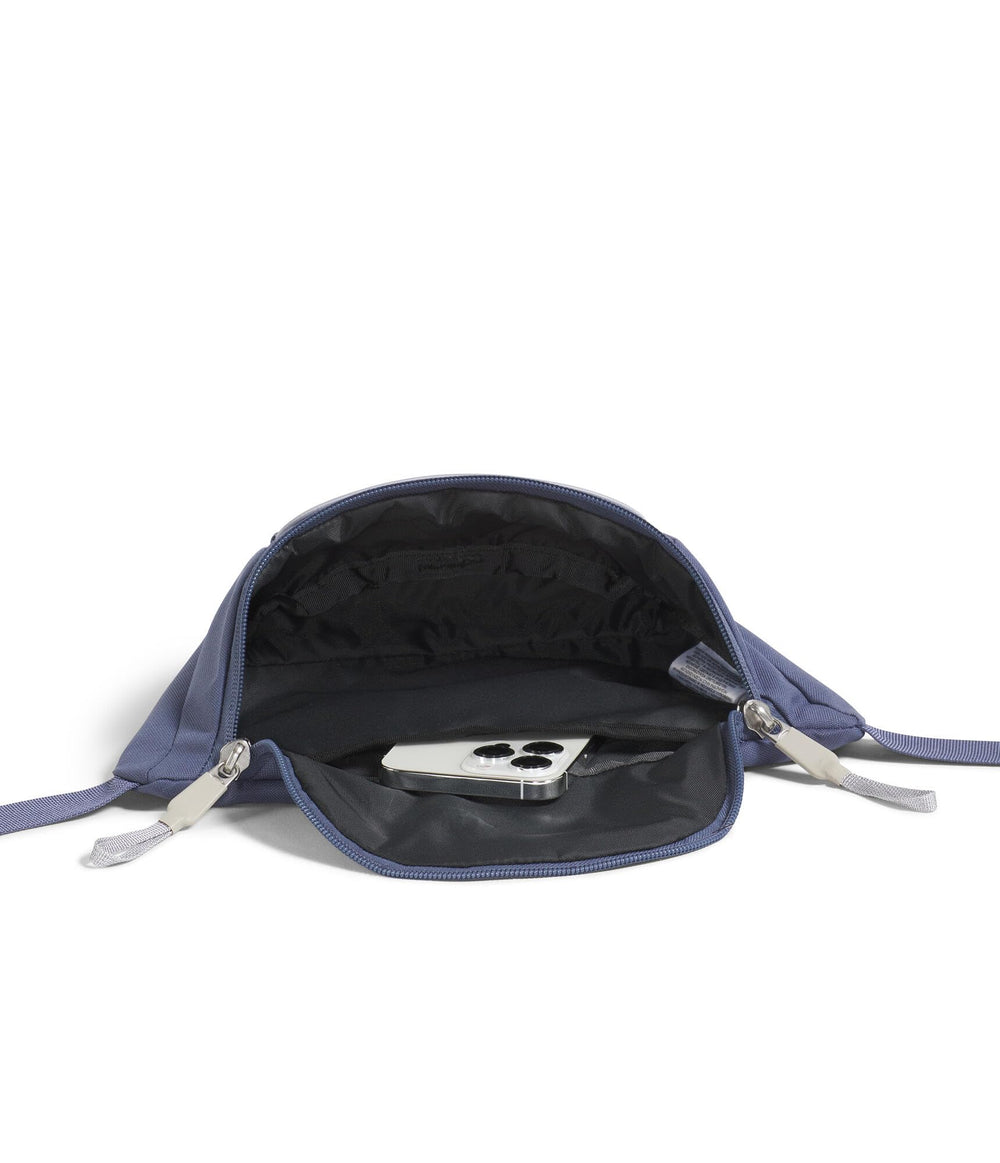 The North Face Jester Lumbar Pack water-repellent finish helps protect your essentials in light rain.
