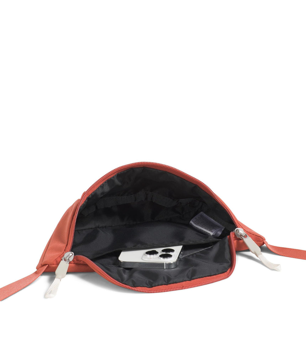 The North Face Jester Lumbar Pack water-repellent finish protects belongings in light rain