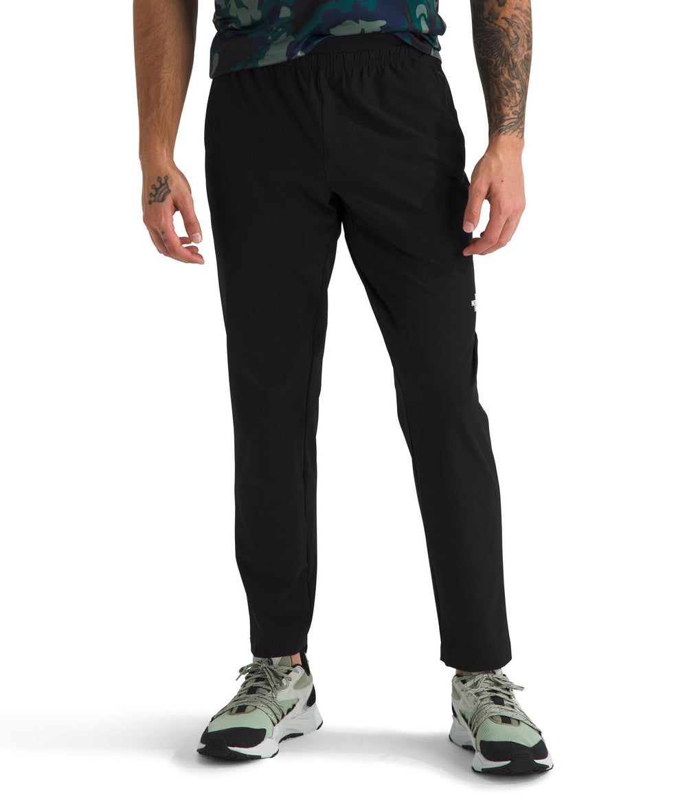 The North Face men's 24/7 woven jogger front view shows durable fabric for daily wear.