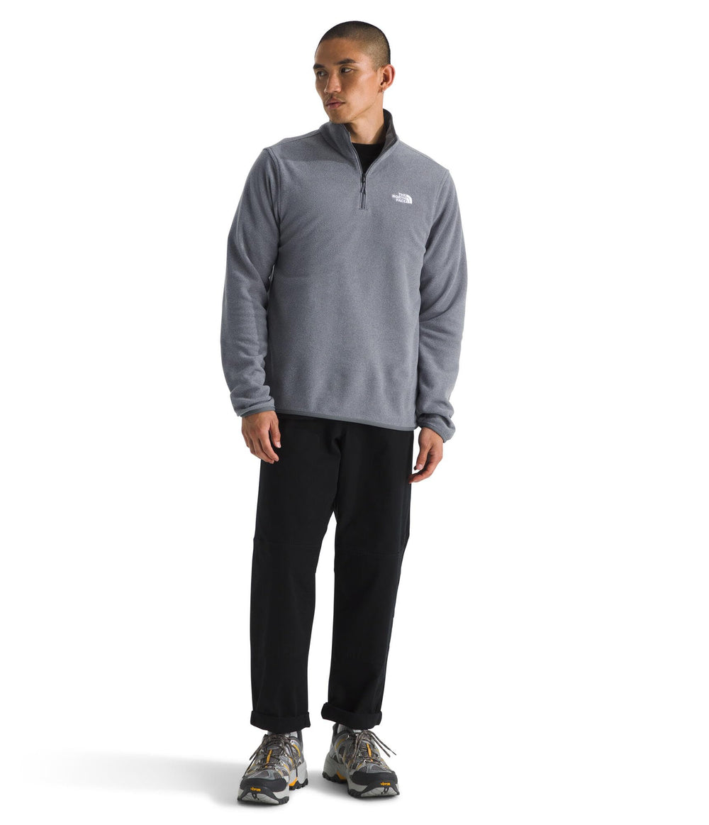 The North Face Men's Glacier Fleece Quarter Zip jacket worn during outdoor activity for all-day comfort