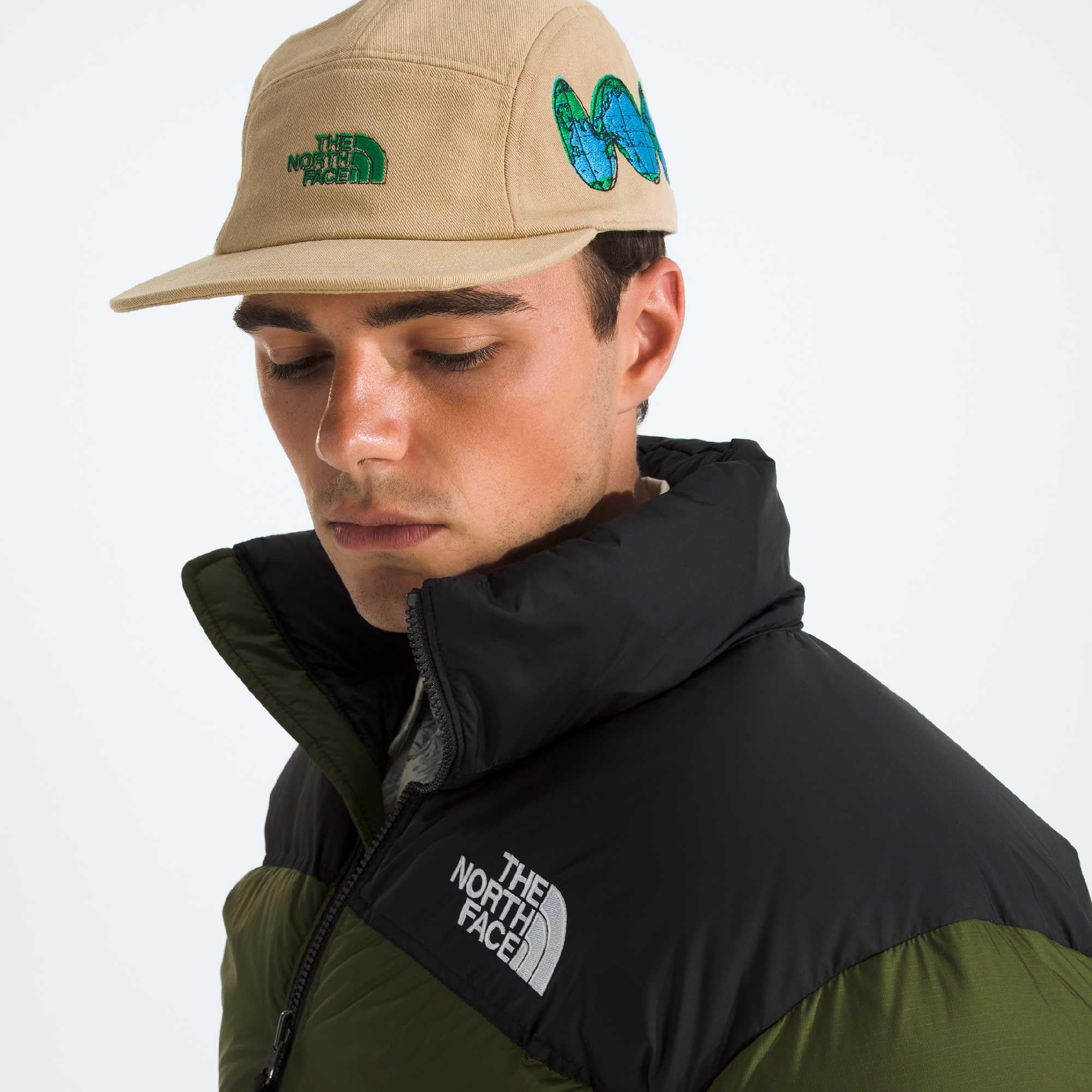The North Face Norm Camp Hat in khaki stone graphics for versatile styling.