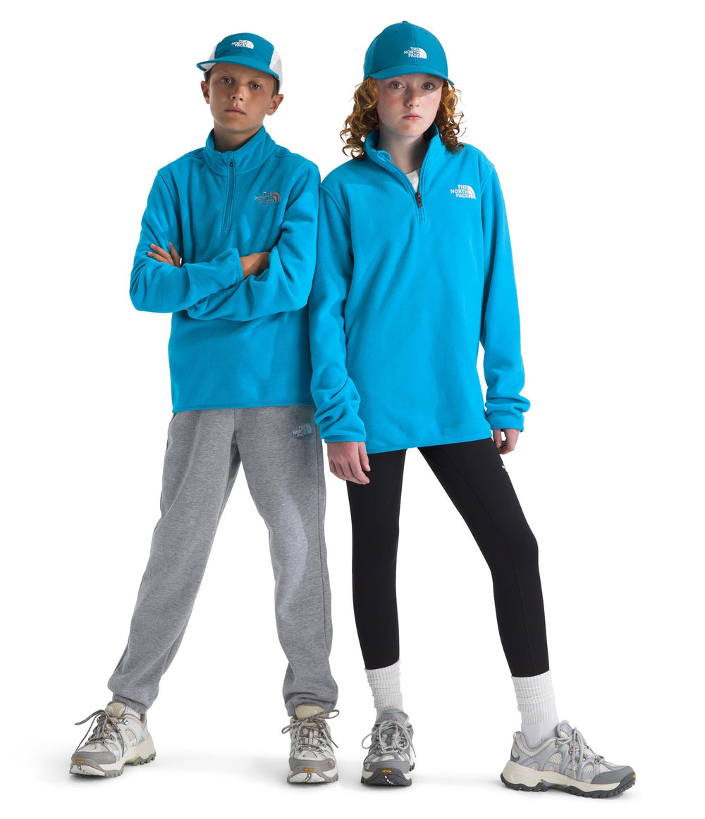The North Face Teen Glacier Quarter-Zip Pullover front view in Meridian Blue, warm fleece for outdoors.