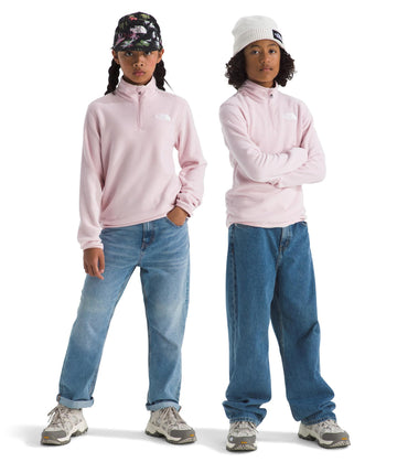 The North Face Teen Glacier quarter-zip pullover front view shows warm recycled fleece for everyday comfort.