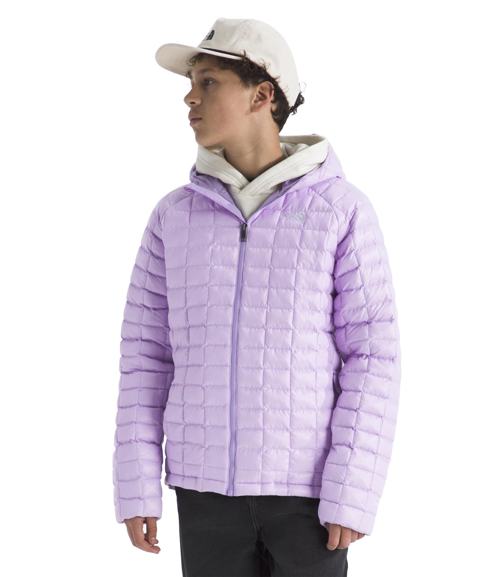 The North Face Teen Thermoball Jacket side pocket emphasizes secure zip storage during hikes.