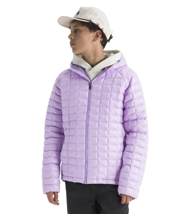 The North Face Teen Thermoball Jacket side pocket emphasizes secure zip storage during hikes.