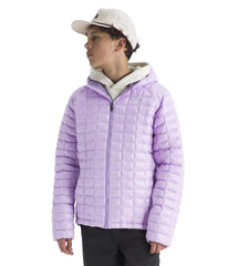 The North Face Teen Thermoball Jacket side pocket emphasizes secure zip storage during hikes.