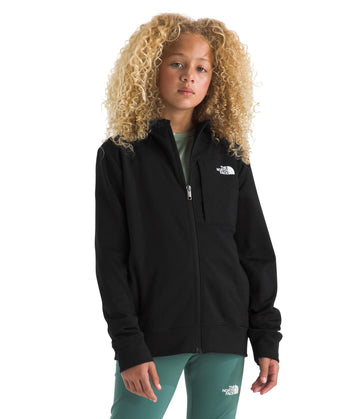 The North Face Teen TNF Performance Fleece jacket worn for urban and trail-ready layering