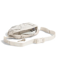 The North Face Terra Lumbar hip pack zipper close-up, secure main pocket for valuables.