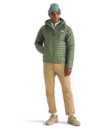 The North Face Thermoball Hooded Jacket adjustable hood shows customizable warmth.