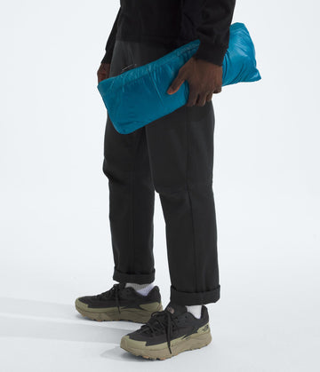The North Face Thermoball Hooded Jacket front zip with draft flap blocks cold air.