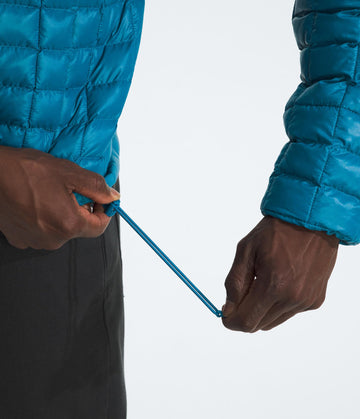 The North Face Thermoball Hooded Jacket logo detail on chest.