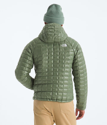 The North Face Thermoball Hooded Jacket packable-in-pocket demonstrates easy storage.