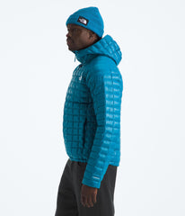 The North Face Thermoball Hooded Jacket packable for travel warmth.