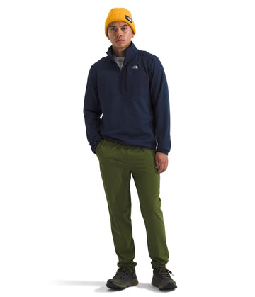 The North Face TNF performance fleece chest pocket closeup showing secure-zip storage