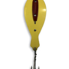 The Reliable Spoon 8" Bunker Spoon Banana Yellow gliding lure for striped bass trolling.