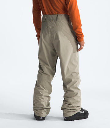 The North Face Freedom Stretch pant mobility shown during ascent with articulated knees for easy movement.