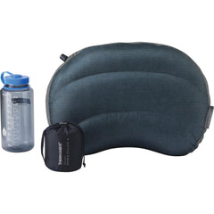 Therm-a-Rest pillow close-up shows removable cover and down insulation for comfort.