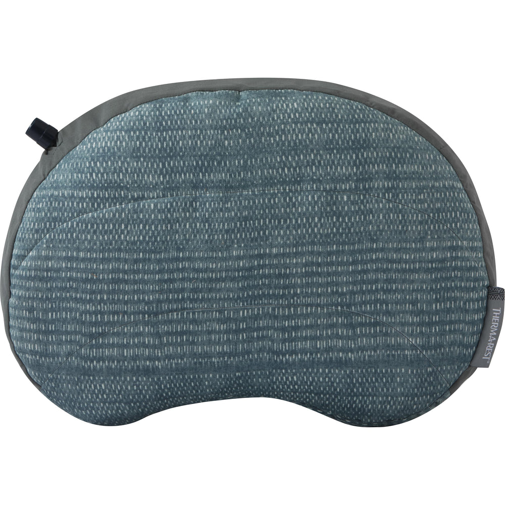 Therm-a-Rest Air Head Pillow in blue cover offers soft comfort for camping and travel.
