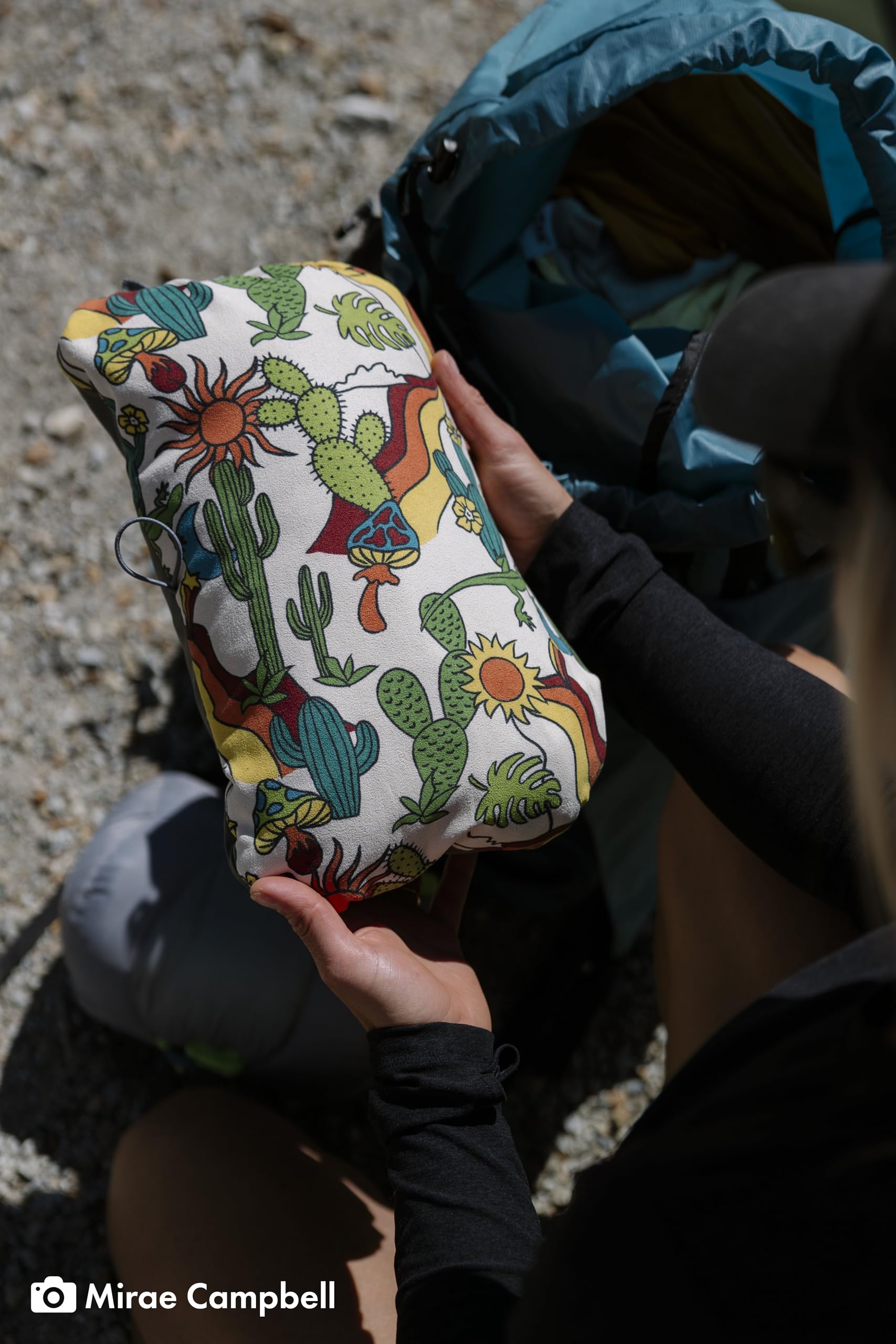 Therm-a-Rest Compressible Cinch Pillow cinch cord demonstrates adjustable firmness for customized support