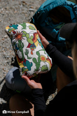 Therm-a-Rest Compressible Cinch Pillow cinch cord demonstrates adjustable firmness for customized support