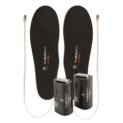 Therm-ic Heat Flat insoles placed in a snow boot for instant warmth