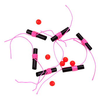 Thill Premium Bobber Stops hot pink closeup highlighting ultra-thin knots for slip floats