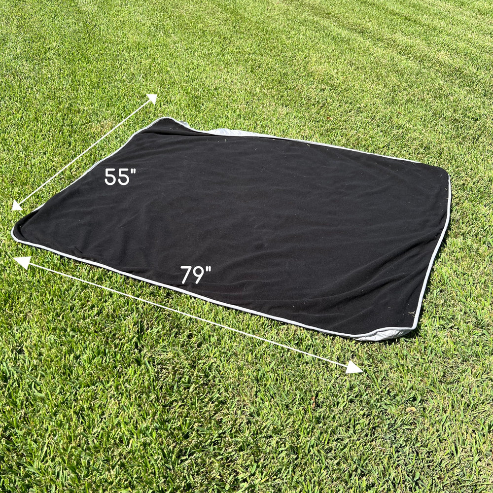 Threadart large 79 by 55 inch blanket laid flat on campsite
