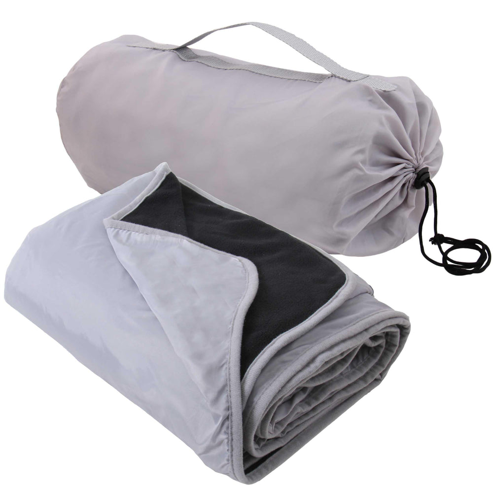 Threadart waterproof stadium blanket folded in black and grey for easy transport