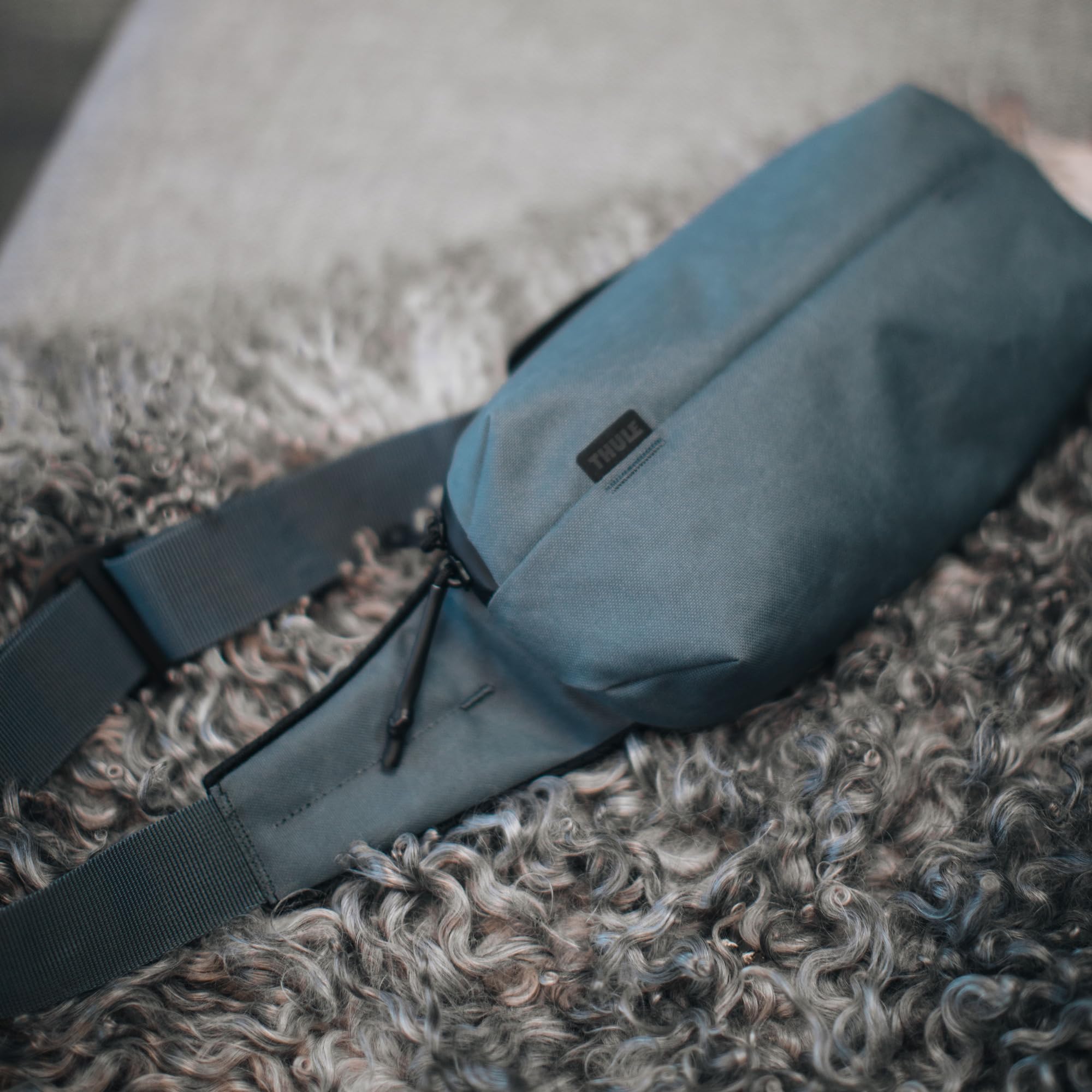 Thule Aion Nutria waxed canvas exterior conveys rugged weather readiness.