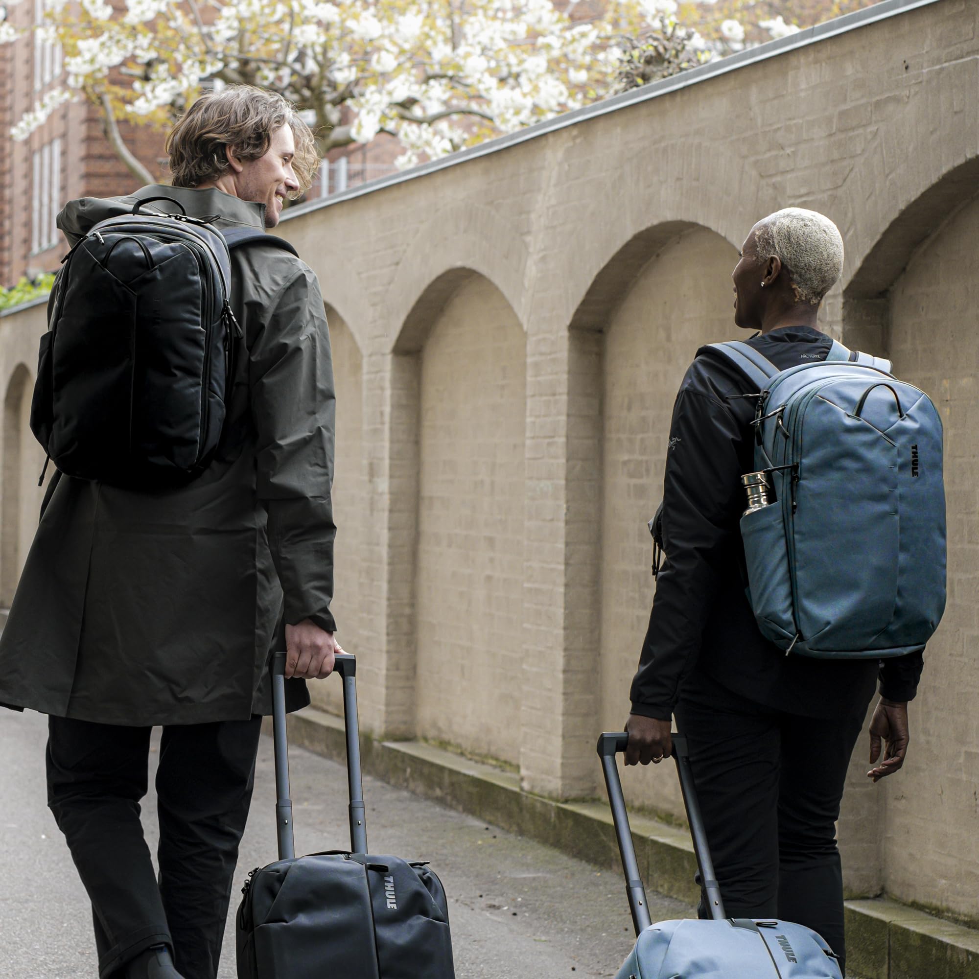 Thule Aion top pocket securely stores small items for quick reach.