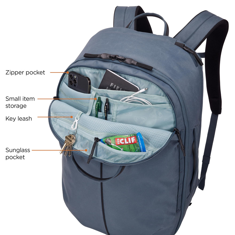 Thule Aion Travel Backpack 40L side view highlights accessible storage layout.