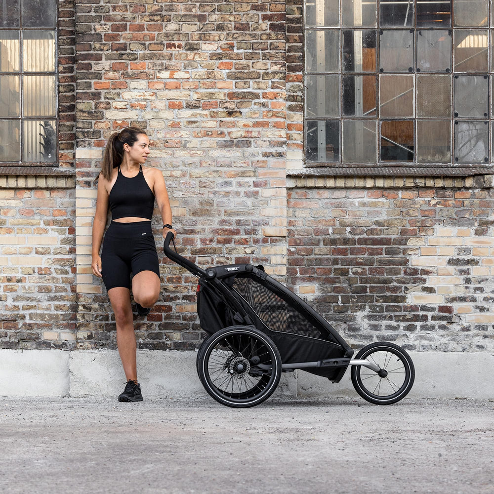 Thule Chariot jogging kit with thru-axle attachment provides enhanced fixation during runs.