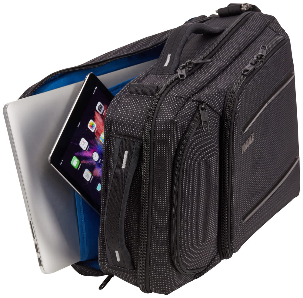 Thule Crossover 2 dedicated laptop and tablet storage with padding.