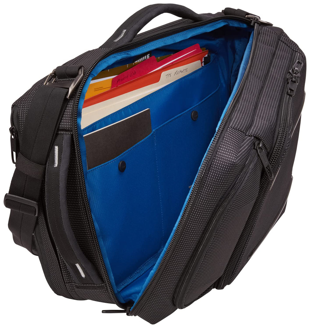 Thule Crossover 2 pass-through panel for attaching to rolling luggage.