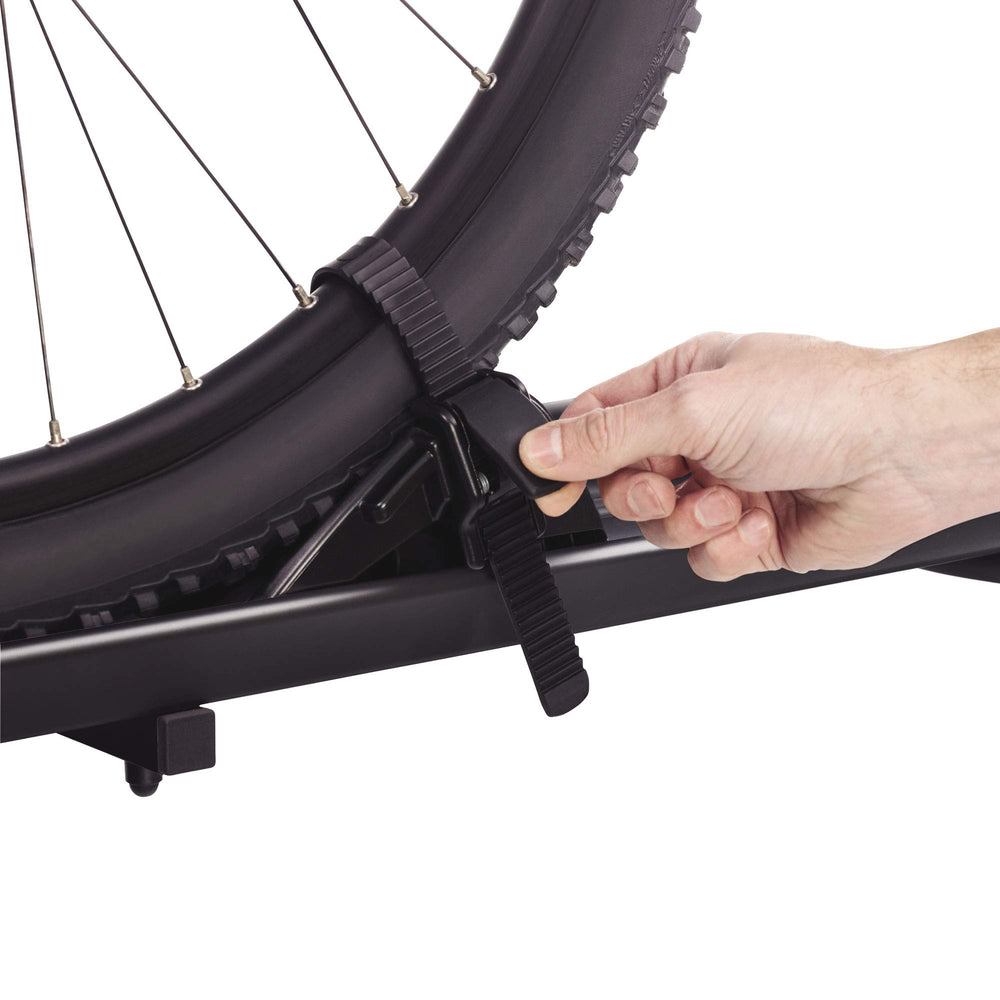 Back door opens with bikes loaded on Thule Elite Van XT.