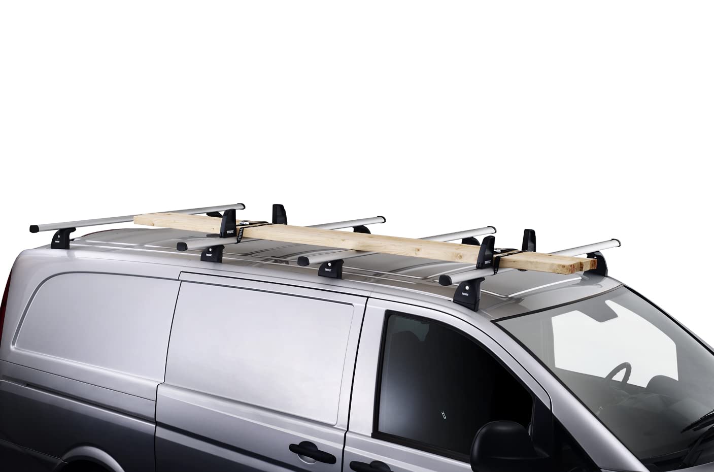 Thule front load stop system compatibility image emphasizes reliable securing on crossbars.
