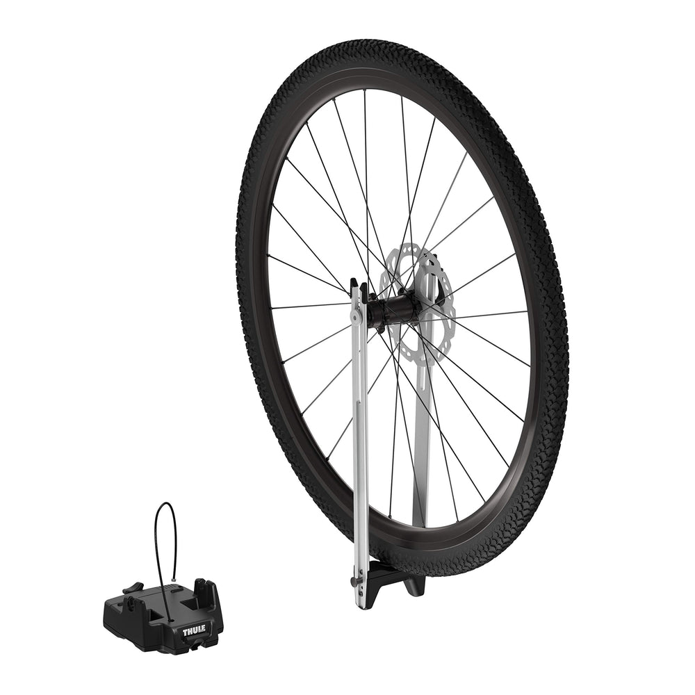 Adapter accessory enables thru-axle compatibility for 12-20 mm bikes.