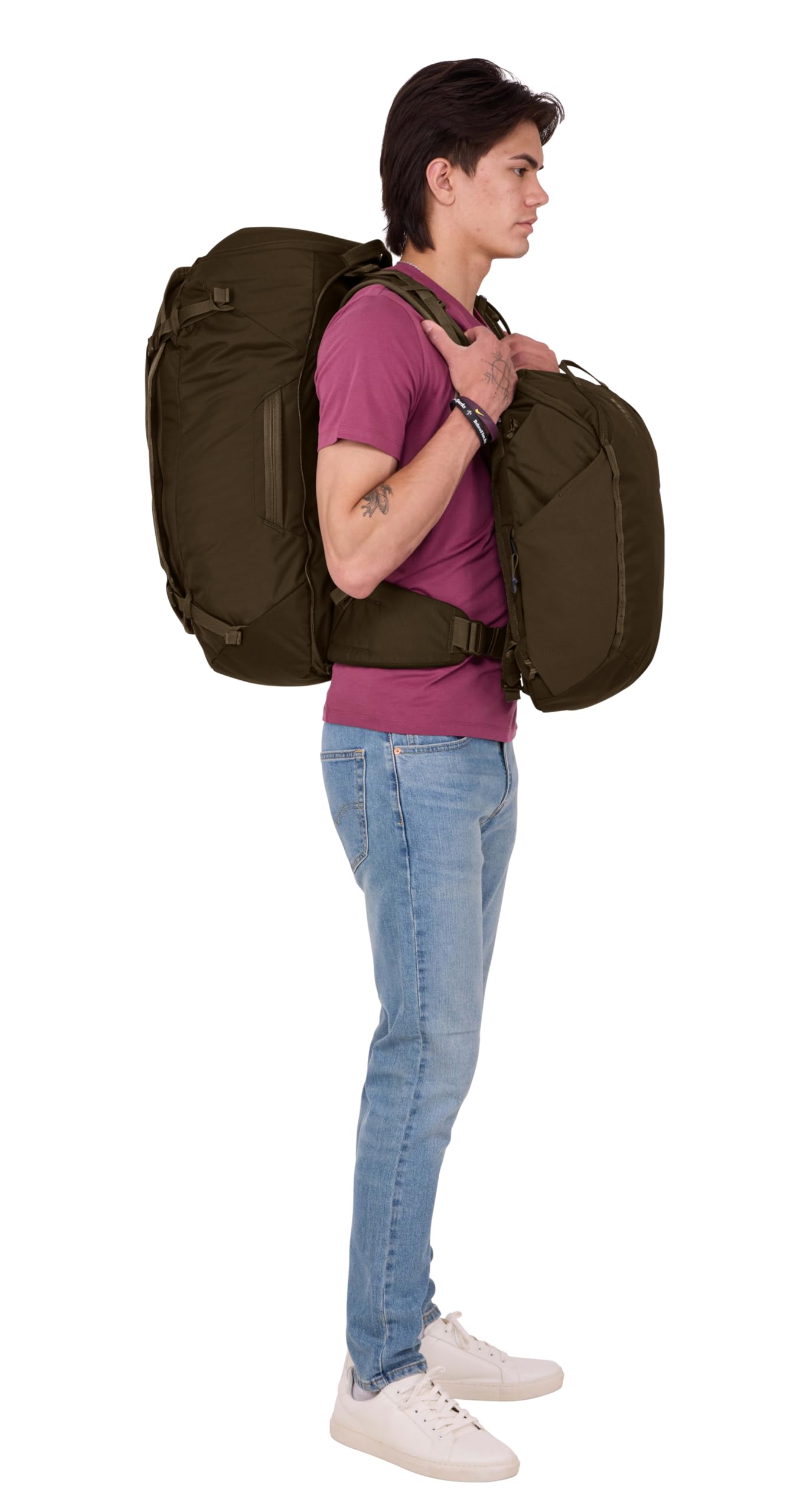 Thule Landmark Backpack70L fits 15-inch MacBook in the main compartment.