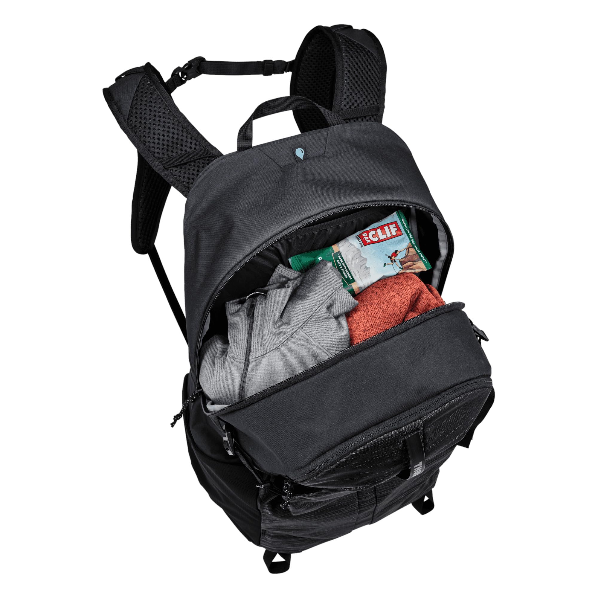 Thule Nanum 25L weather-resistant fabric protects gear in elements.
