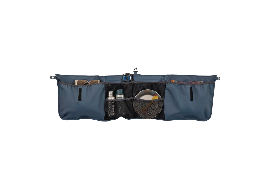Thule Outset Organizer waterproof compartments protect gear in wet conditions.
