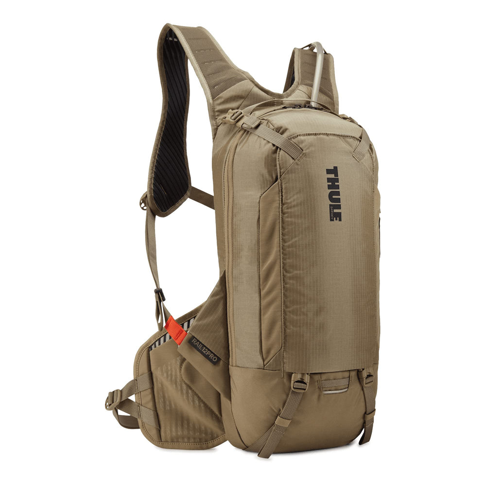 Thule Rail hydration pack mounted on bike showing stability during aggressive trail riding