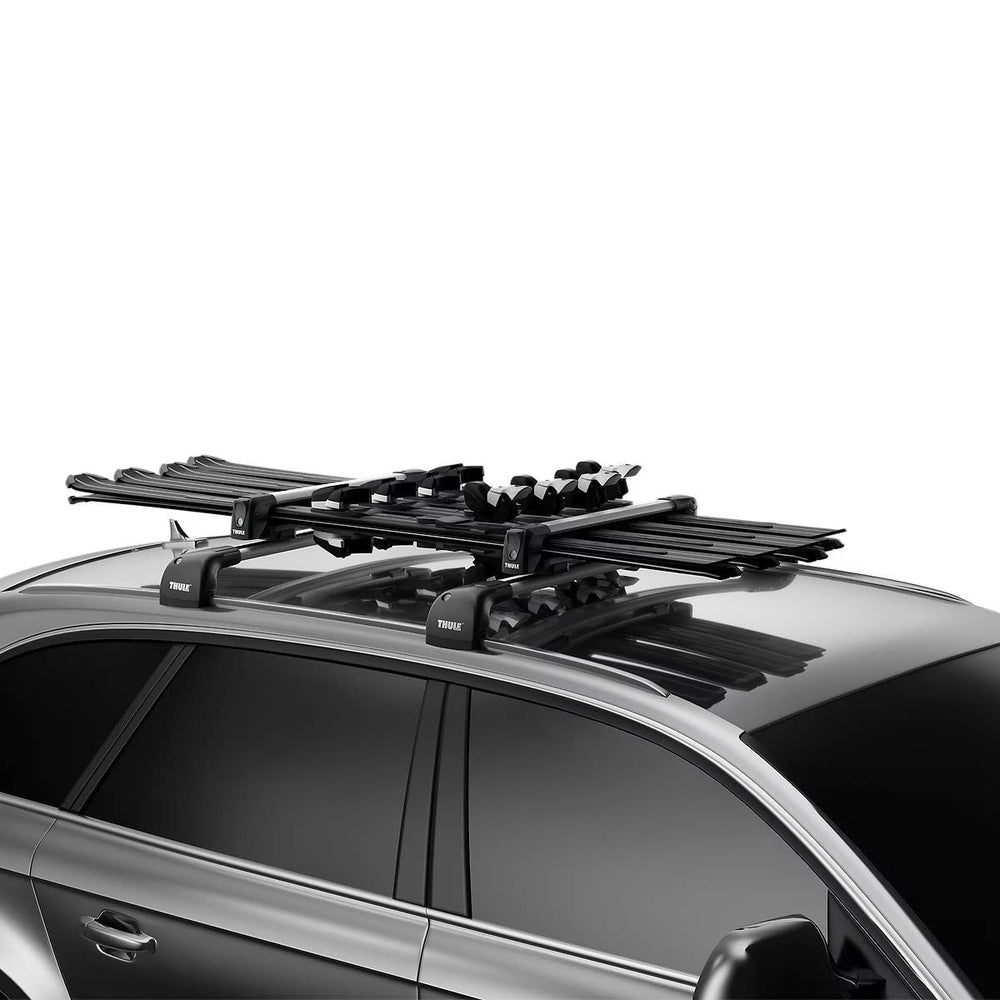 Thule SnowPack anti-theft lock system securing skis to the carrier.
