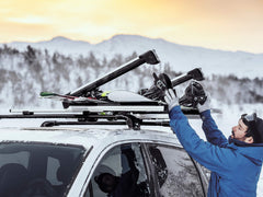 Thule SnowPack Extender holds up to six ski pairs securely on roof