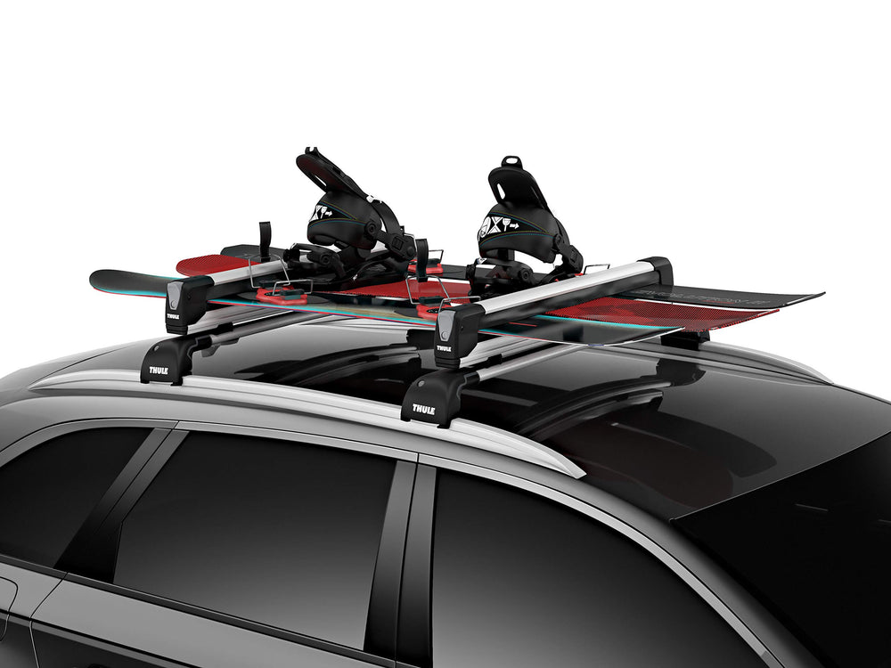 Thule SnowPack Extender loading with gloves demonstrates user-friendly access